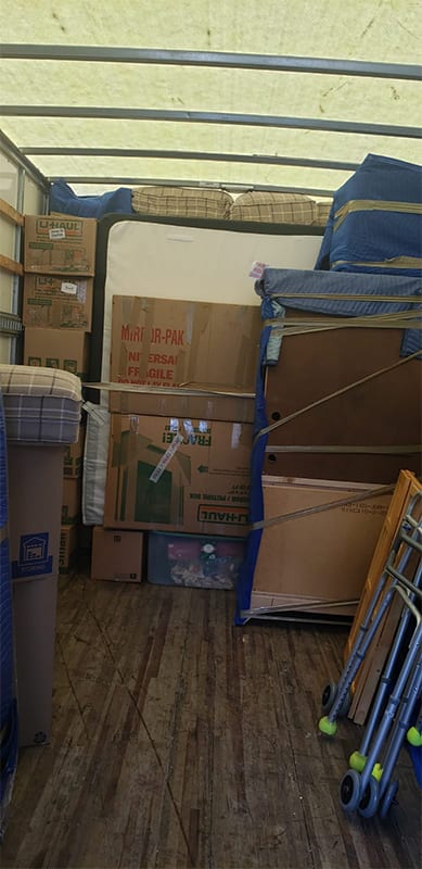 Wrapped furniture in moving truck