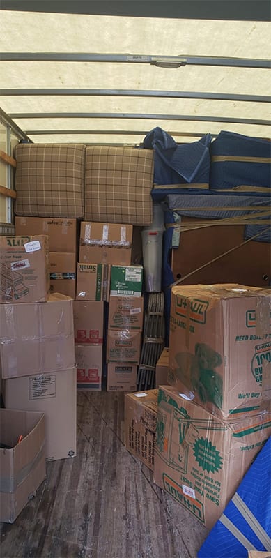 Wrapped packages and boxes in large moving truck