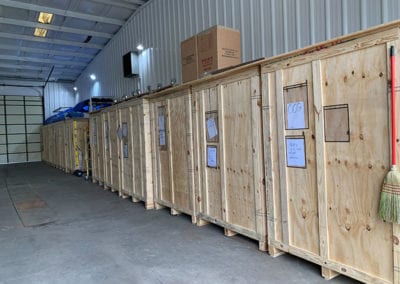 Storage crates sitting on floor in secure unit